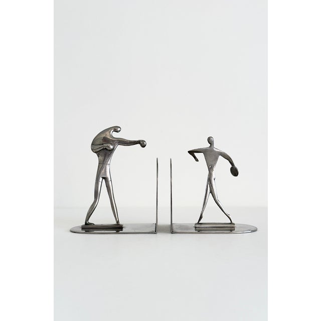 A pair of early mid-20th century figural bookends in nickel-plated brass with an excellent age-appropriate patina. Each...