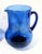 Here we have 3 pieces of mid century blown, cobalt blue glass. 1 pitcher, and to stemless wine glasses. The pitcher has an...