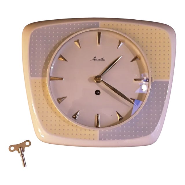 Mid-Century German Machanical Wall Club Clock in Cream-Colored Ceramic with Yellow-Blue Decor from Mauthe, 1950s For Sale