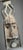 This Kanaga mask, emblematic of the Dogon culture of Mali, is carved from light wood then patinated with natural pigments....
