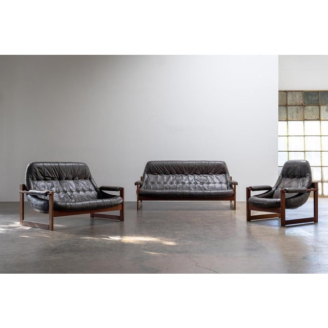 Sofas by Percival Lafer Brazil, 1970s Original seating group by Percival Lafer, Brazil, 1970s – including a three-seater,...