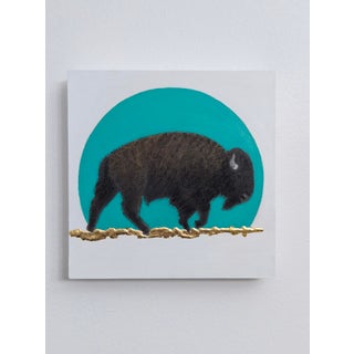 Green Sunset by Tammy Liu-Haller | Charcoal, pastel, ink, acrylic on encaustic panel with gold leaf Bison silhouette against a teal circle. For Sale
