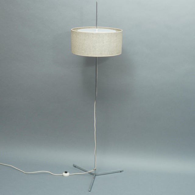 For sale is a minimalist floor lamp from the 1960s. The shade is height-adjustable. European Plug (up to 250V).The wiring...