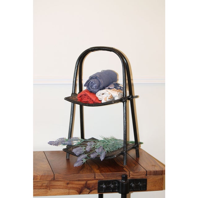 Appropriate at floor height or on top of a table, this could work to hold everything from magazines to cut flowers or...