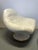Rodica armchair and footstool by Mario Brunu for Comfort, Italy, from the 1960s. The armchair's seat shell rests on the...