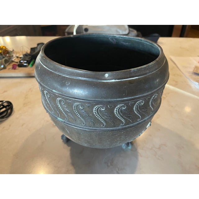 Beautiful antique vintage jardiniere/planter with raised shield motif all around. Has patch repairs in brass--see detail...