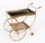 This is a very entertaining vintage two tier brass French drinks trolley, mid-century, 1950s in date. It has a scroll push...
