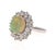 This ring has a gorgeous Oval Cut Opal in the center that weighs 2.72 Carats and has a clusterof 28 Round Cut Diamonds...