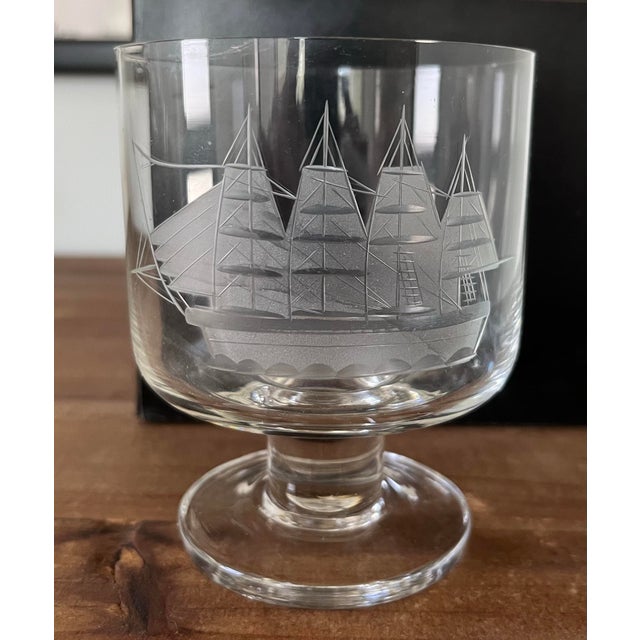 Set of 4 footed tumblers each with a ship etched into its frosty bowl. Add these hip clipper ships to your vintage barware...