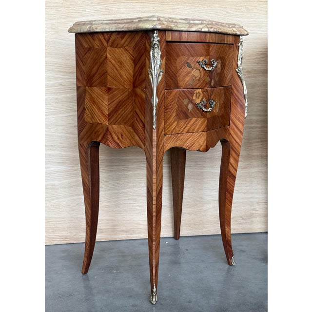 Pair Antique French Louis XV Marquetry marble top nightstands offer a lot of style in diminutive packages! The subtle...