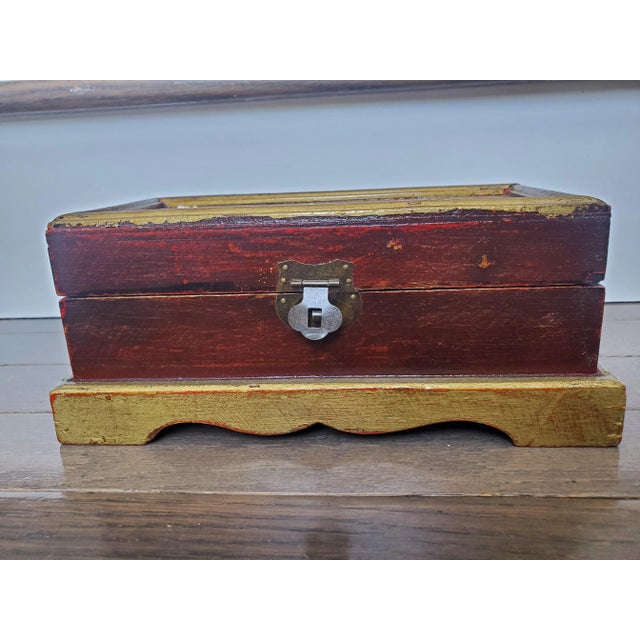 Antique wooden jewelry box with beautifully faded gilded trim and deep rosewood tone finish. Embellished with seed pearls...