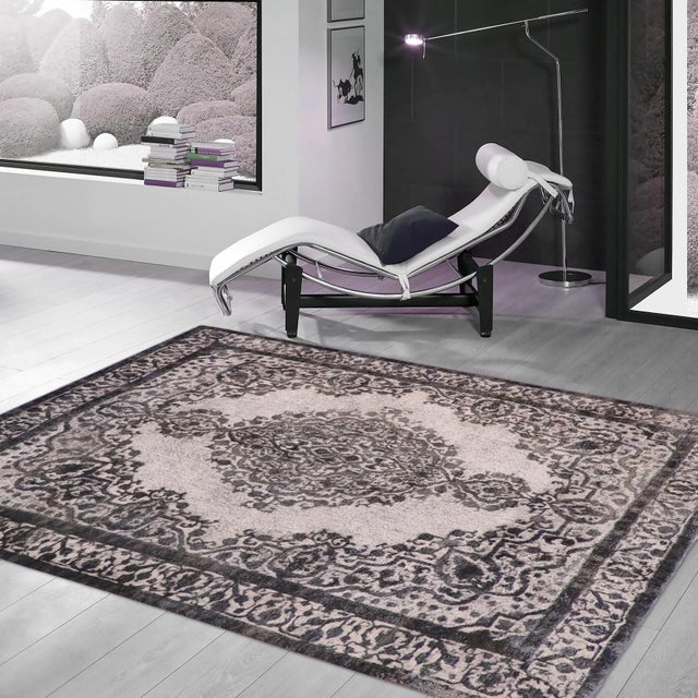 Elevate your home with the timeless beauty of a handmade Persian rug, renowned for its exceptional craftsmanship, rich...