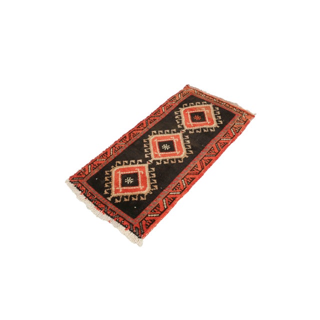Vintage Handknotted decorative mini rug from Kars region of Turkey. Approximately 45-55 years old. In very good condition.