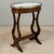 Antique French Neoclassical Oval End Table with Carrara Marble is a delightful design rendered to resemble a pair of lyres...