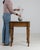 Fluted-leg marble-top side table in Golden Oak. Its golden oak finish sets off reeded tapered legs, inset grey marble top,...