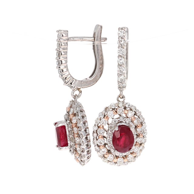 Roshe Jewels Ruby Earrings, 3.55 Carats Ruby and Diamond Earrings in 14K Gold These earrings have 2 Natural Oval Cut...