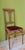 A beautiful chair from the 1920s, retaining its original upholstery. It is in the Art Nouveau style and features a central...