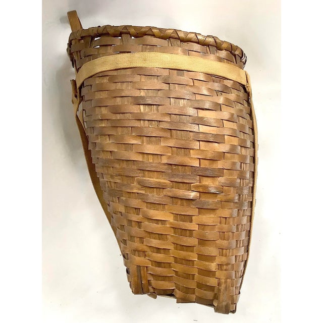 Circa 1940s/50s beautifully made large splint canted pack basket with original straps found in the Adirondack region of...