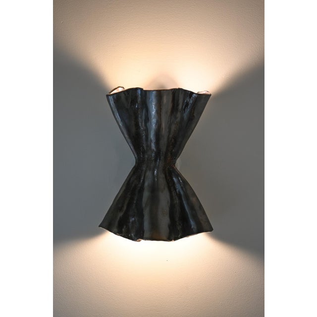 The Pierre sconce was designed in collaboration with Brooklyn-based ceramicist Ethan Streicher of Streicher Goods. This...