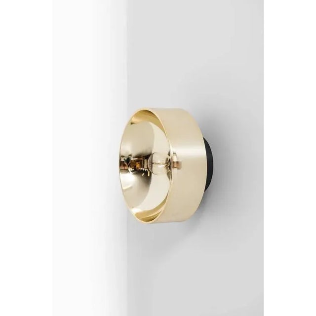 Large quantity of wall lamps designed by Peter Celsing. Produced by Falkenbergs Belysning in Sweden. Designed in 1966 for...