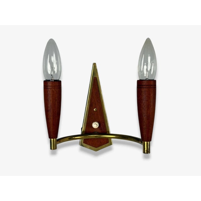 Danish Mid-Century Modern, Teak, Brass, Wall Light or Sconce, Denmark, 1960s A patinated brass and teak two light wall...