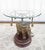 Vintage bronze elephant Maitland-Smith round glass top side table. This piece is solid, sturdy, and completely functional....