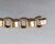 Brown Vintage Signed Napier Goldtone Emerald Cut Faux-Topaz Bracelet For Sale - Image 8 of 10