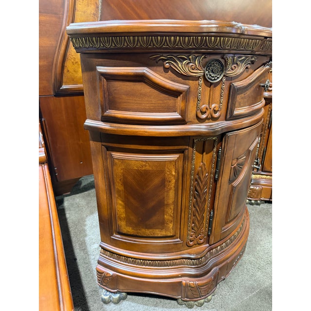 An opulent expression of Old World European design, this AICO Amini “Cortina” nightstand embodies the grandeur and romance...