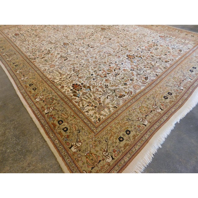 Dazzling hunting scene on beige back ground, within gold tone border. Rare oversize, unique and one-of-A-kind. 11'4"x 15'4"