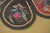 This Chinese embroidered silk child’s collar was used for festivals. Each of the six lobes features a flower or fruit...