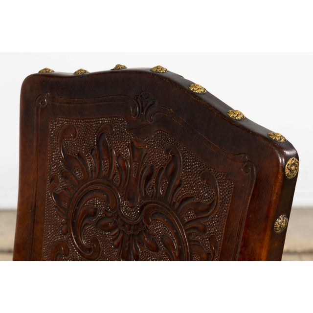 Late 19th century French Renaissance Revival carved oak dining chairs, sourced in Savoie, France. Hand-crafted in solid...