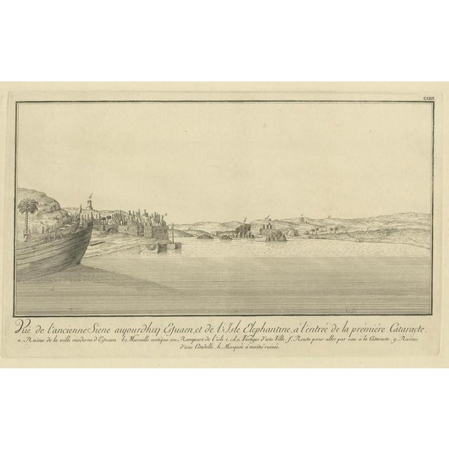 Ancient Syene (Aswan) and Elephantine Island – Egypt Engraving, c.1755 This striking view depicts ancient Syene, present-...