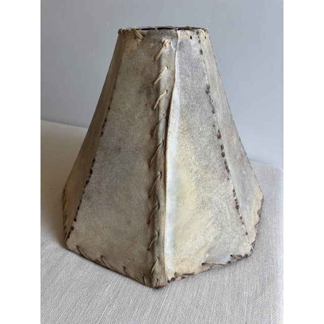 Large, vintage rawhide, 8-sided bell Lamp Shade with gut lacing and iron frame. This rustic, western style shade measures...