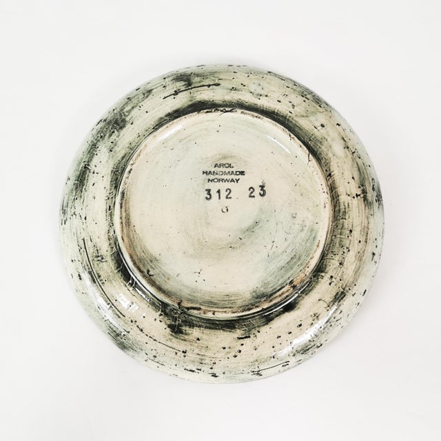 Wall plate, manufactured by Arol, in Norway, 1960s (signed) Inspired by the topography of the Vikings. Made of ceramic,...