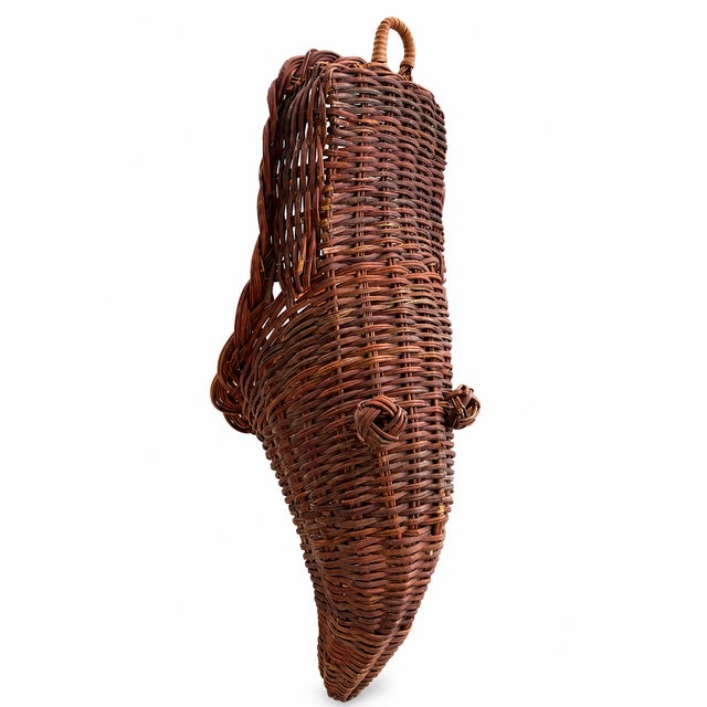 Ready to hang charming vintage handwoven wicker hanging basket, circa 1970s–1980s. Featuring a distinctive tapered...