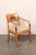 A pair of birch wood Danish armchairs, with upholstered seats, from the mid 19th century. This antique pair of accent...