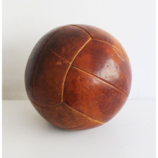 Discover this striking 1950s medicine ball produced by Gala, a Czech company founded in 1949 and known for its high-...