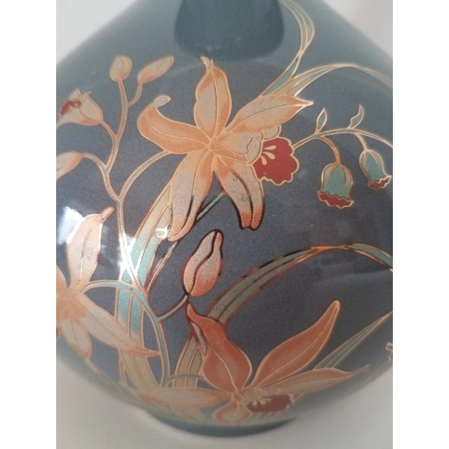 Vintage Japanese Porcelain Floral Vase. The pictures do no justice to this stunning vase. The delicate, floral designs are...