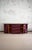 Lacquered Bamboo Sideboard – 1980s Made of red lacquered bamboo with smoked glass top and rush bindings. Decorated with...