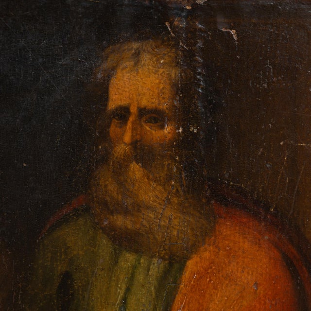 18th-century original painted icon on wood depicting Saint Paul holding a sword, presented as a tall vertical composition....