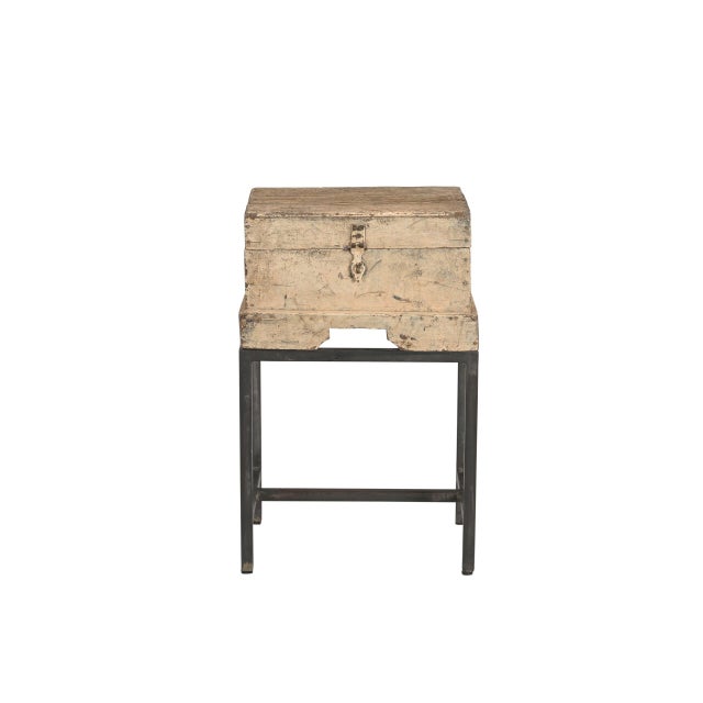 Vintage Indian Painted Teakwood Chest on Iron Legs, in an old cream tinted paint finish. We find antique boxes and put...