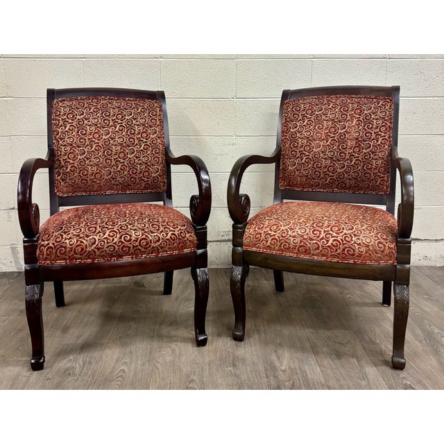 This is a gorgeous pair of vintage Flexsteel French Empire style arm chairs with elements of Regency and Neoclassical...