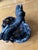 Key points: Natural gnarled branch handle with original knots and bark texture Dark smoked bamboo strips with deep...