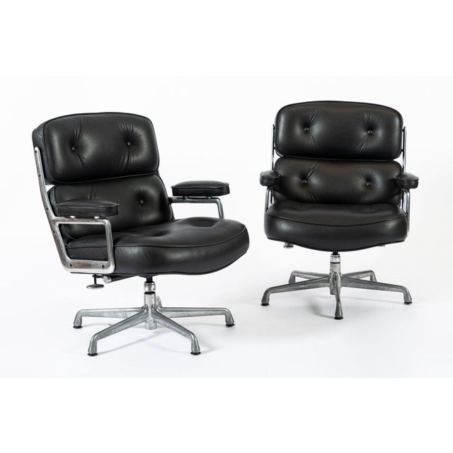 These mid century modern black Model 3475 Eames Time Life Lobby Chairs designed by Charles & Ray Eames for Herman Miller...