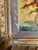 This impressionistic oil painting of a vibrant floral bouquet is an original artwork attributed to and signed by the...