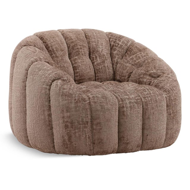 Tufted chenille upholstered plush swivel accent chair in a soft coco brown color. Modern rounded design with sloped arms...