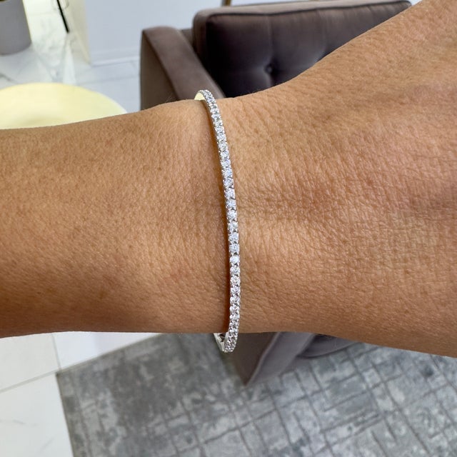 Gender: Women's Metal Type: 14K White Gold Length: 6.75 inches Width: 2.45 mm Weight: 9.72 grams Ladies rhodium plated 14K...