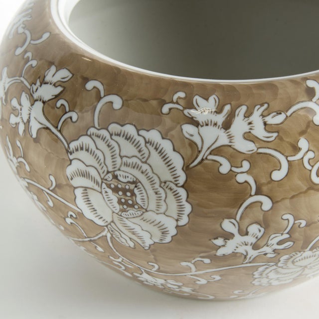 A classic Chinoiserie look in taupe andWhite. In design, taupe is often associated with muted, sophisticated qualities. It...