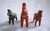 Set of three vintage Dala Wood Horses from Sweden. The larger horse measures 4"H x 4"L x 1.25 'W and the two smaller ones...