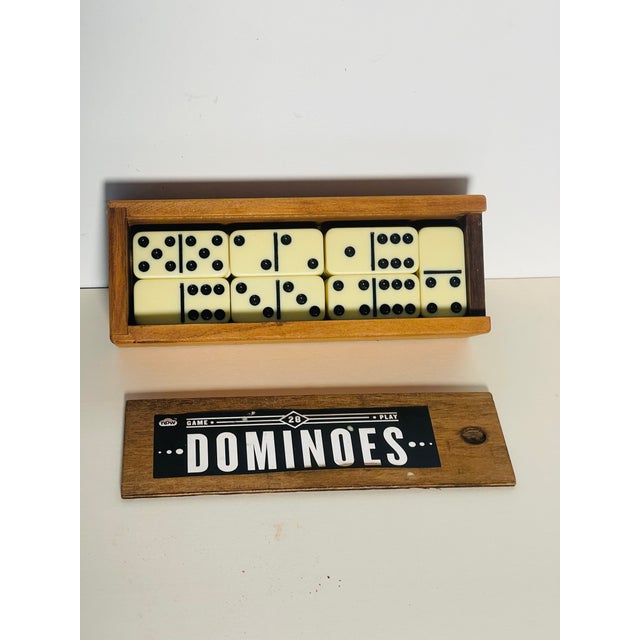 Vintage Dominoes game in wooden box.